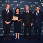 Accelerate's co-owner Stephanie Hronis recieves the award for third place at the Longines World's Be